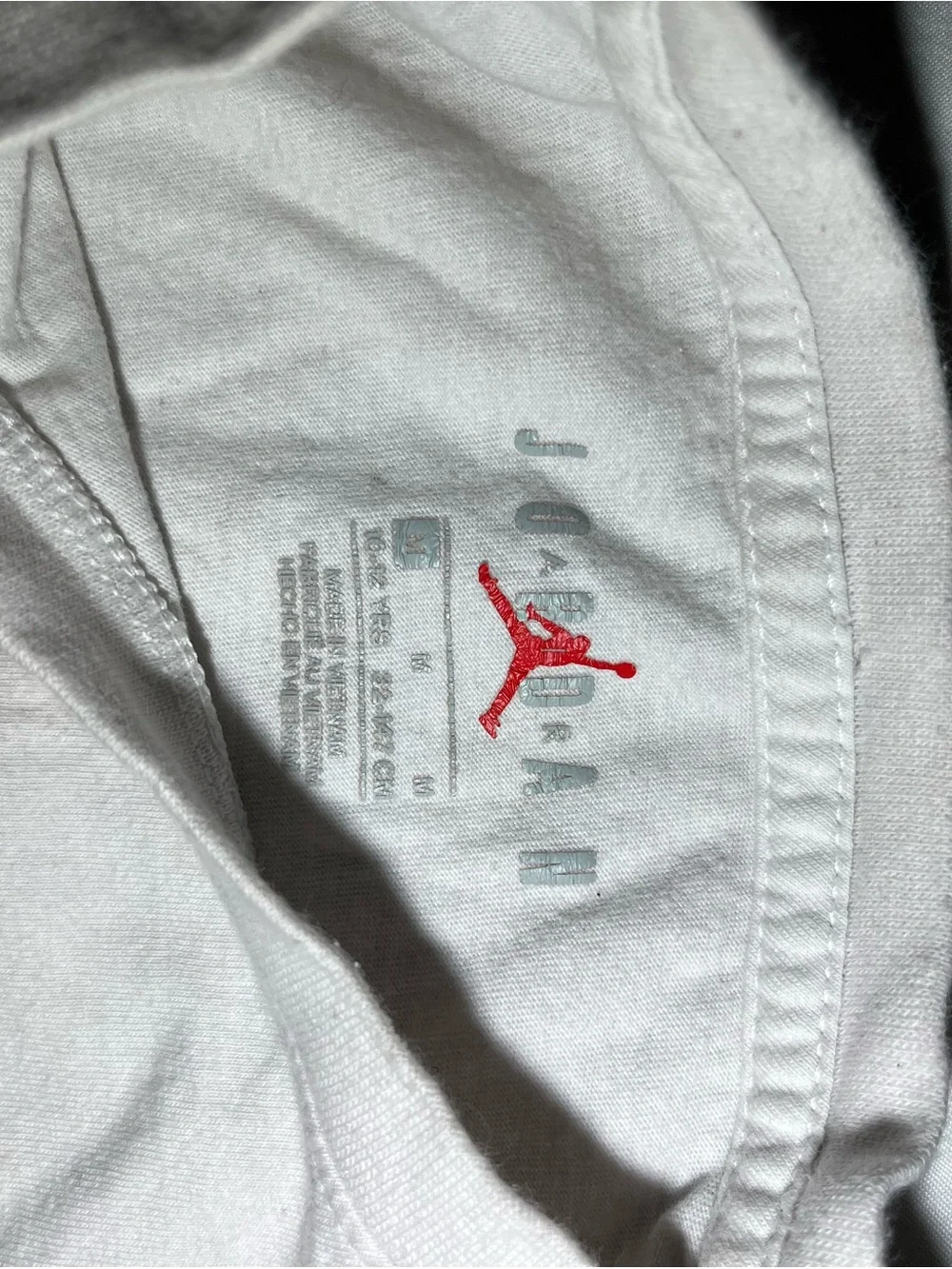 Jordan Short-Sleeve Tee with Red Jumpman Graphic on White